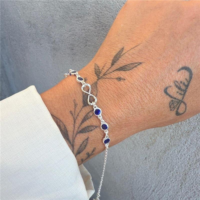 PULSEIRA INFINITO COM PONTOS DE LUZ AZUL ESCURO